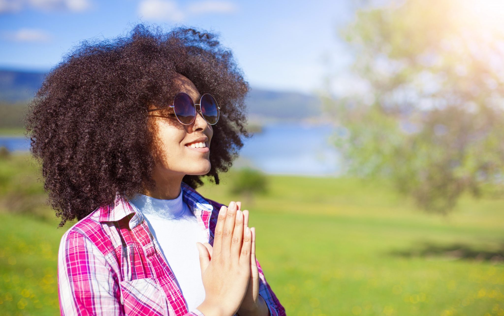 praying girl in nature