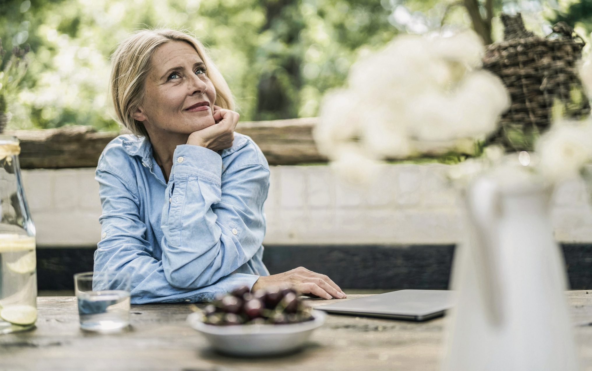 woman sitting at the table