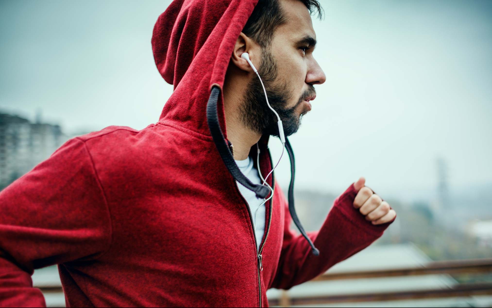 man running in the rain