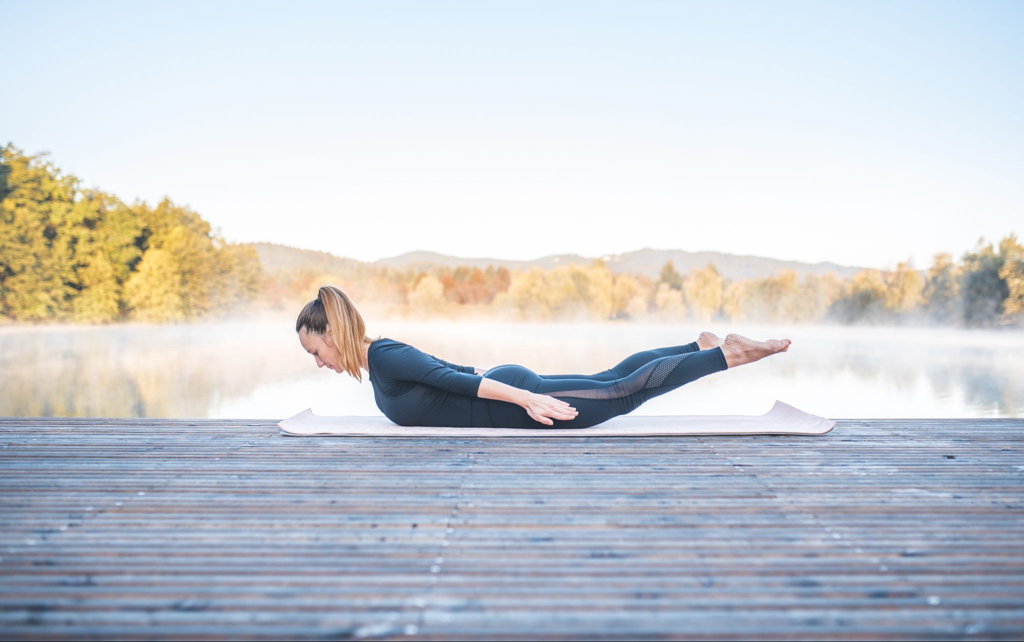 girl doing a locust pose